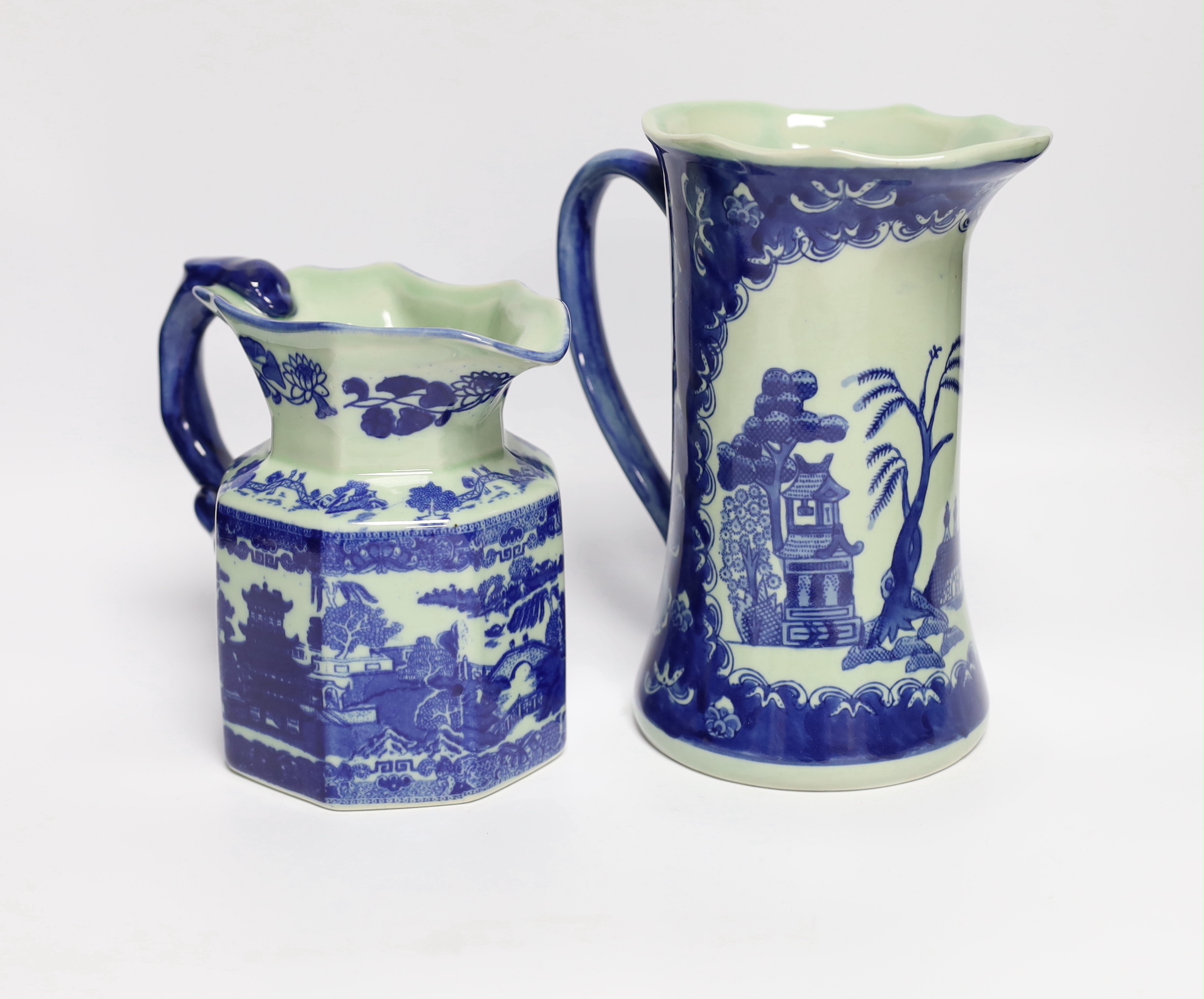 Two 20th century Chinese blue and white jugs, tallest 22cm